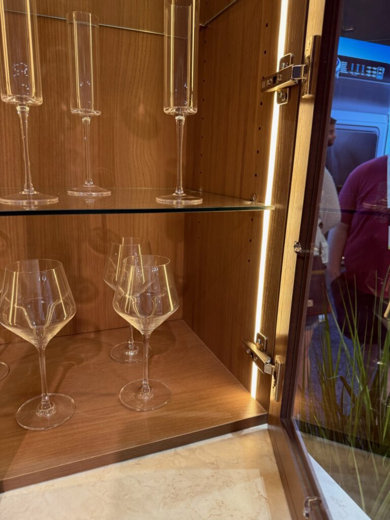 Cabinet with front interior  LED strip to display the crystal wine glasses inside. 